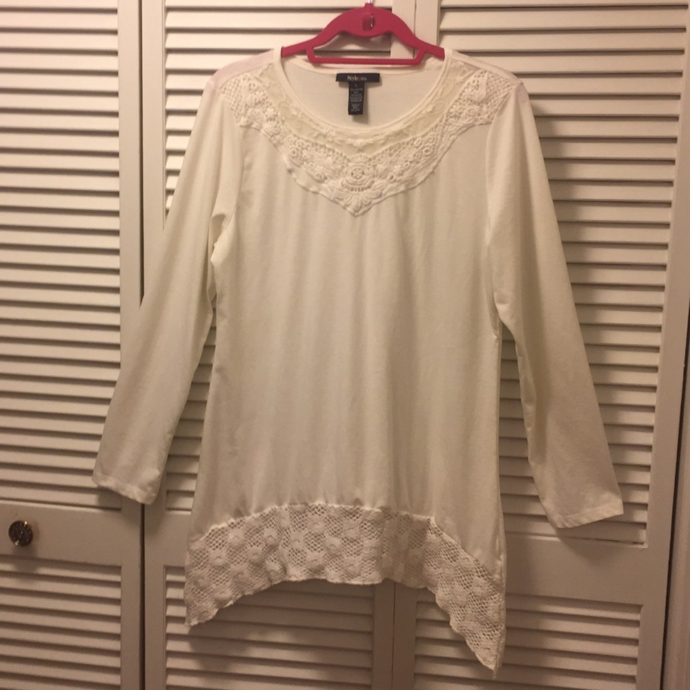 Knit top with lace borders at neck and hem